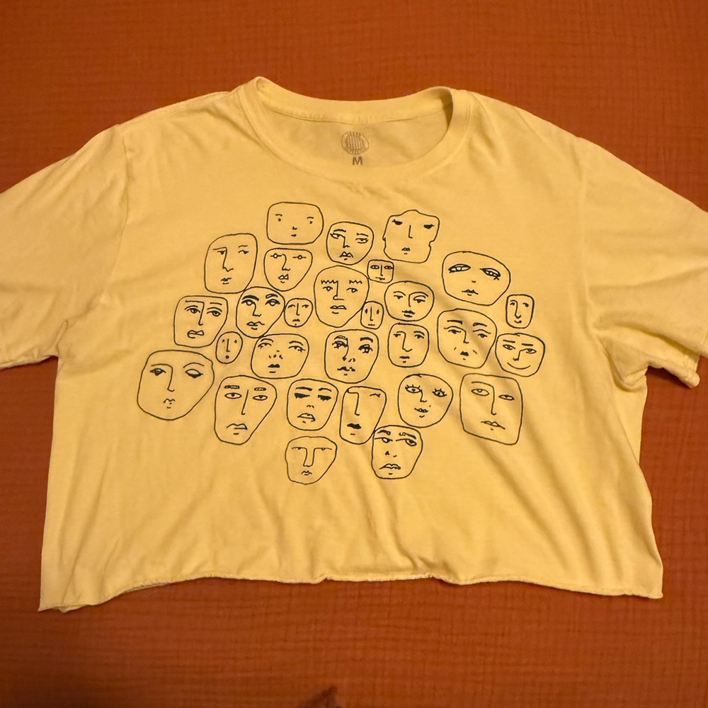Urban Outfitters cropped tee shirt with faces